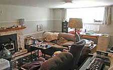 Basement a chaos of clutter before staging by Debra Gould